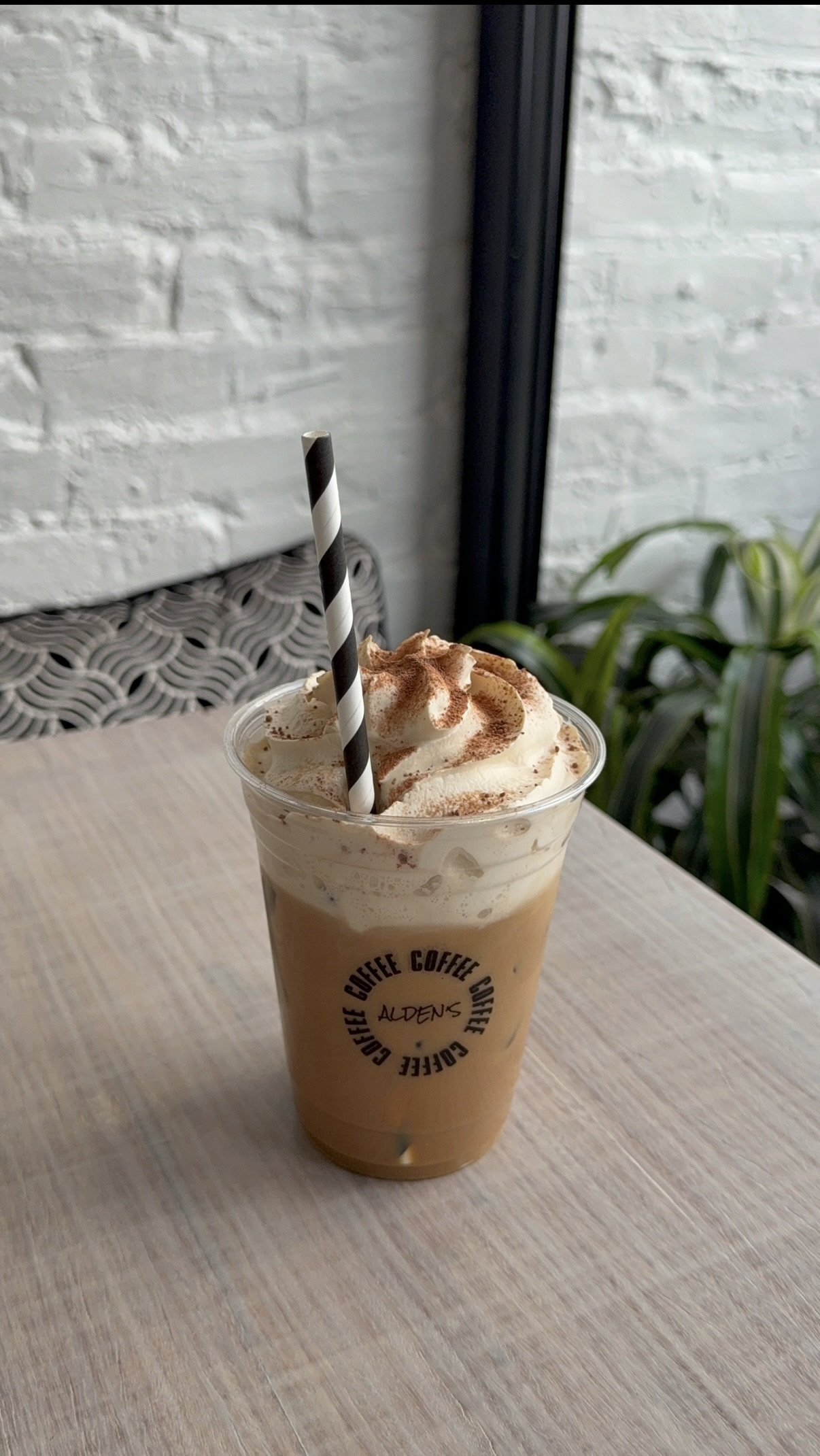 Alden's tiramisu latte on a table